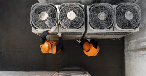 men-working-with-equipment-full-shot men-working-with-equipment-full-shot